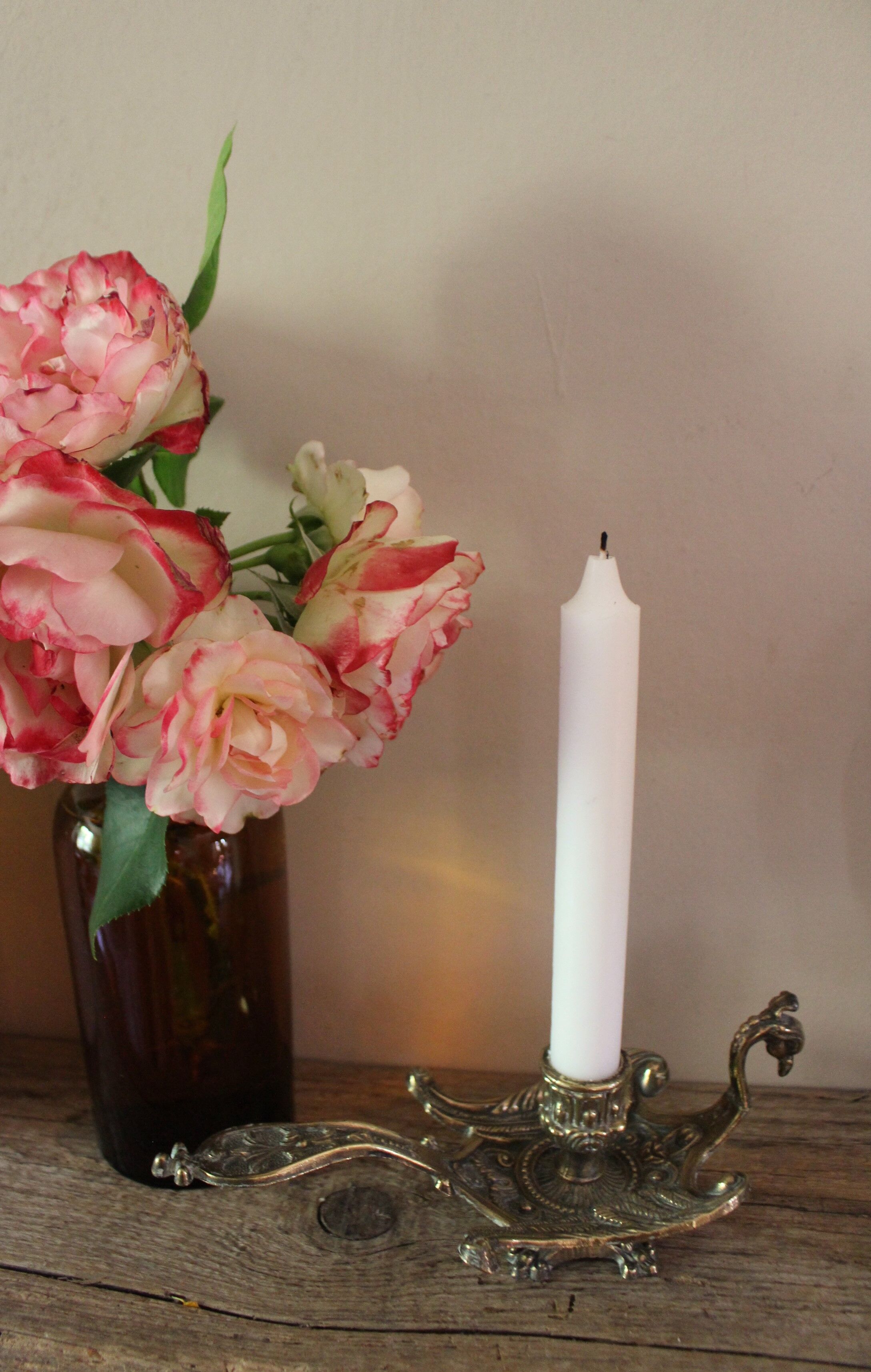 Brass candle holder cave rat peacock