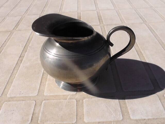 Fine pewter milk jug