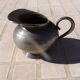 Fine pewter milk jug