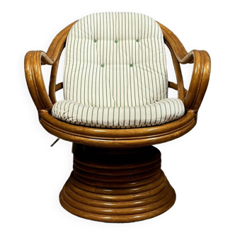 Vintage swivel and tilt rattan armchair with cushions