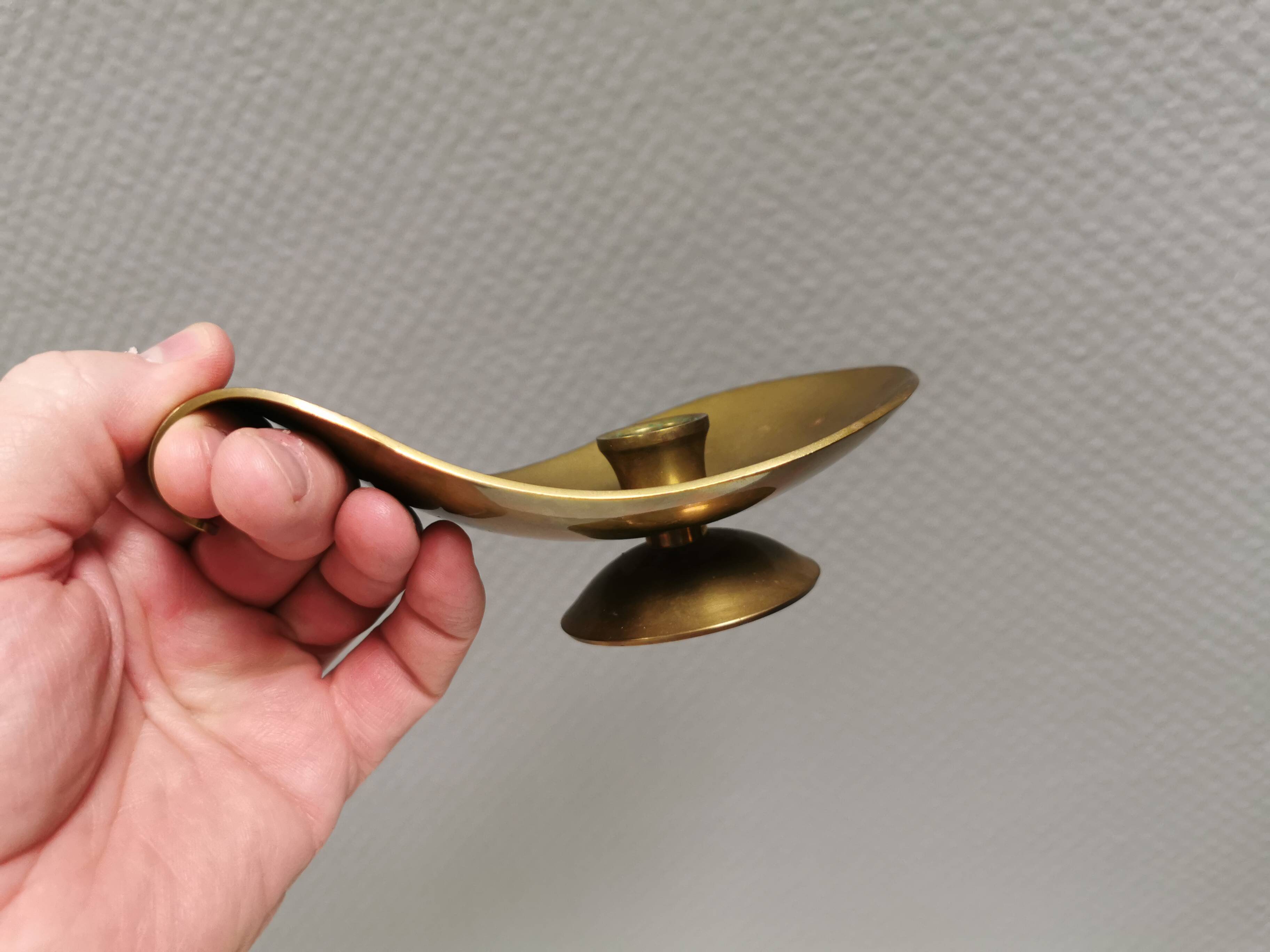 Brass candlestick for a single candle