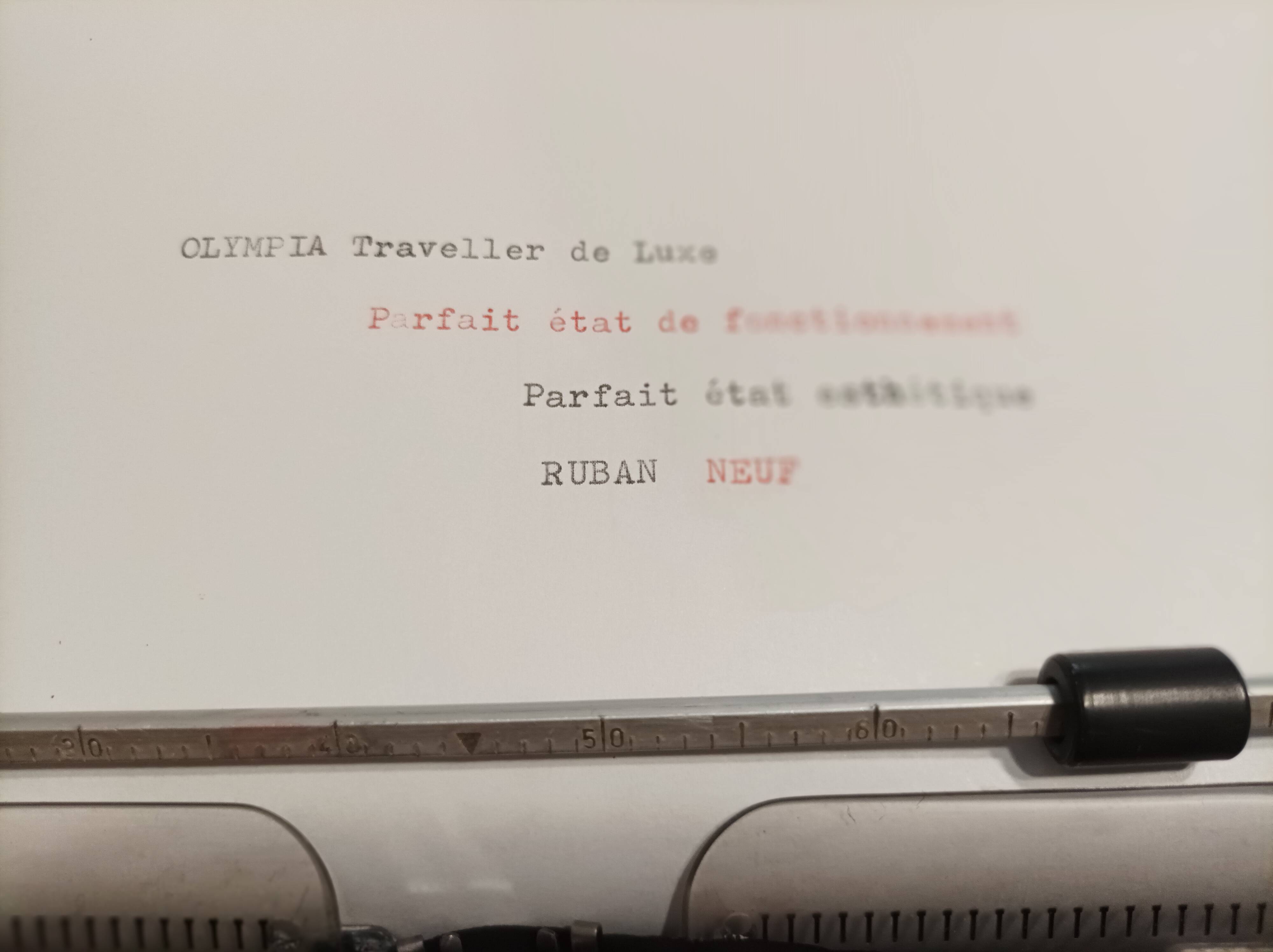 Olympia traveler de luxe orange typewriter serviced and new ribbon