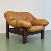 Pair of brutalist leather lounge chairs, 1960s