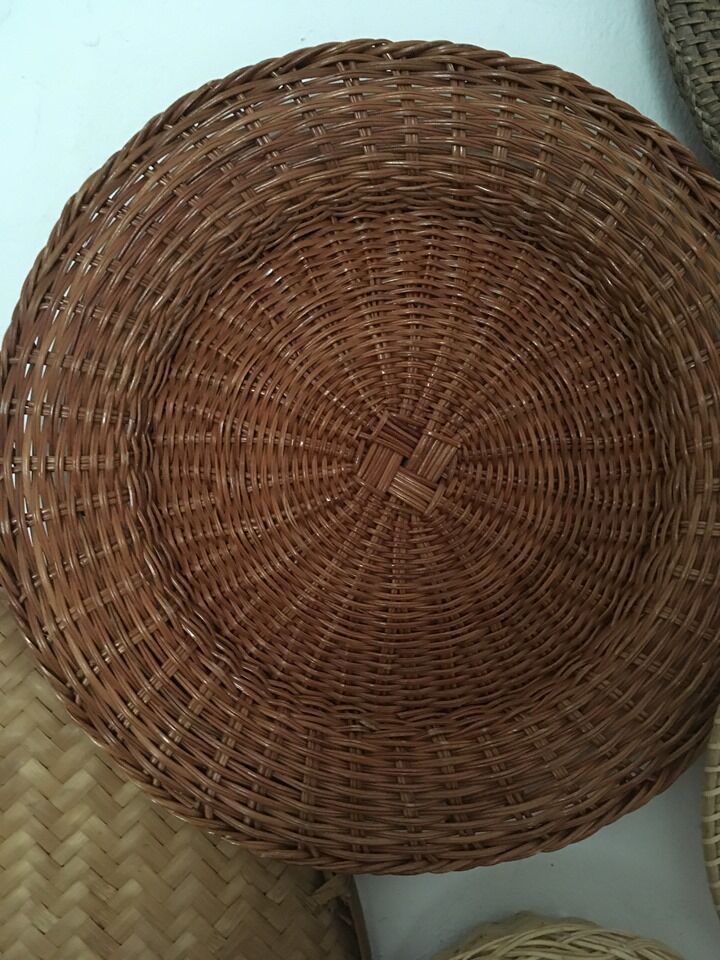 Wall composition of 8 baskets and wicker trays.