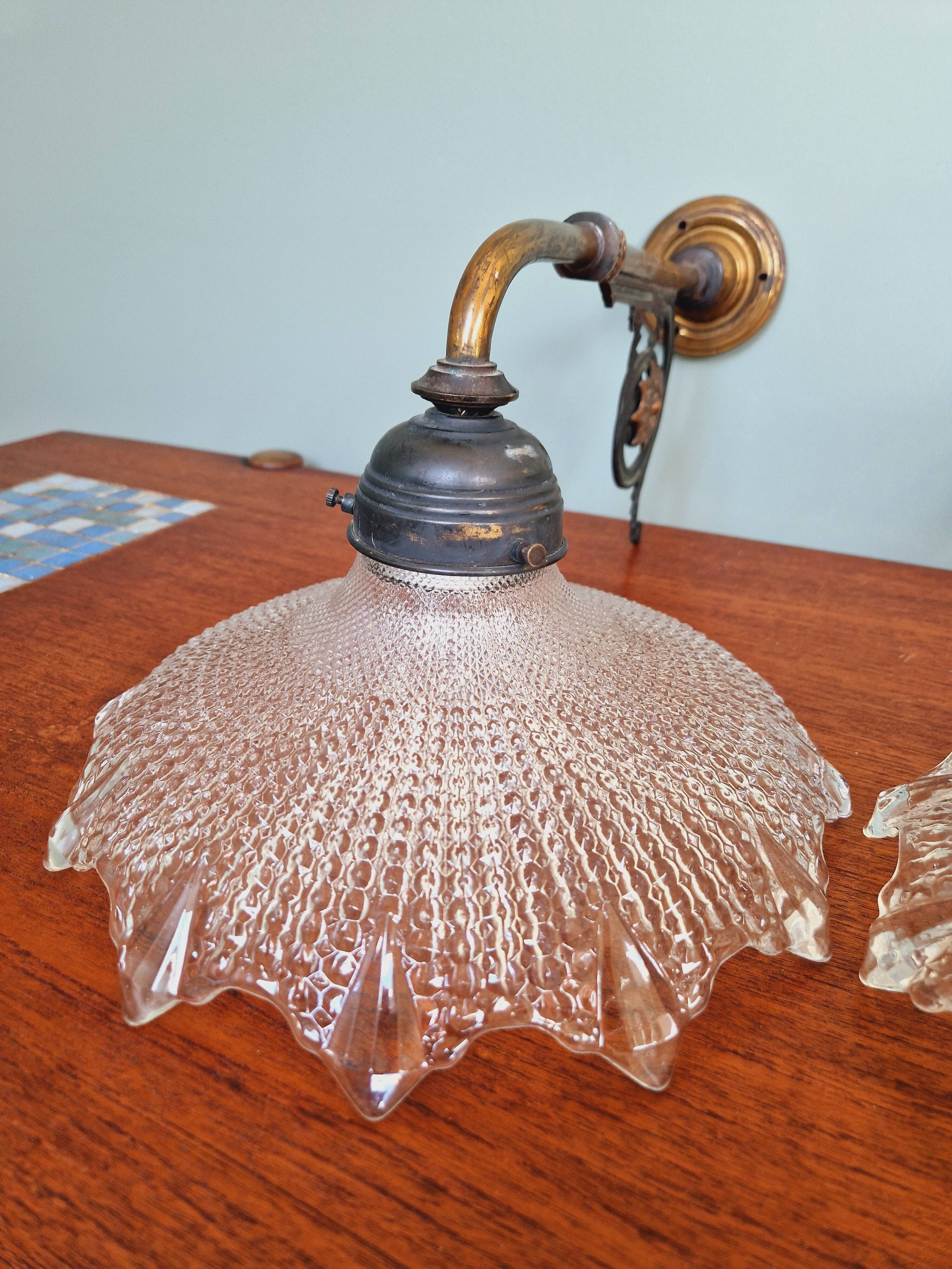 Pair of pendant lights in bronze and scalloped transparent glass