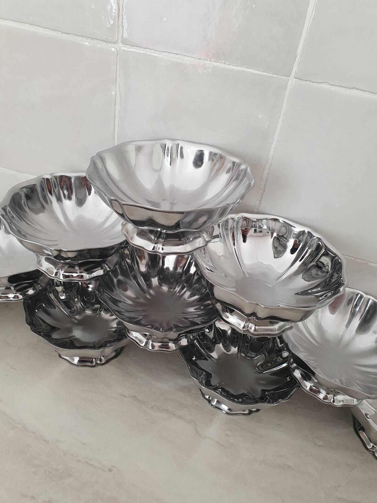 10 stainless steel dessert / ice cream bowls in Guy Degrenne style, flower shape.