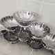 10 stainless steel dessert / ice cream bowls in Guy Degrenne style, flower shape.