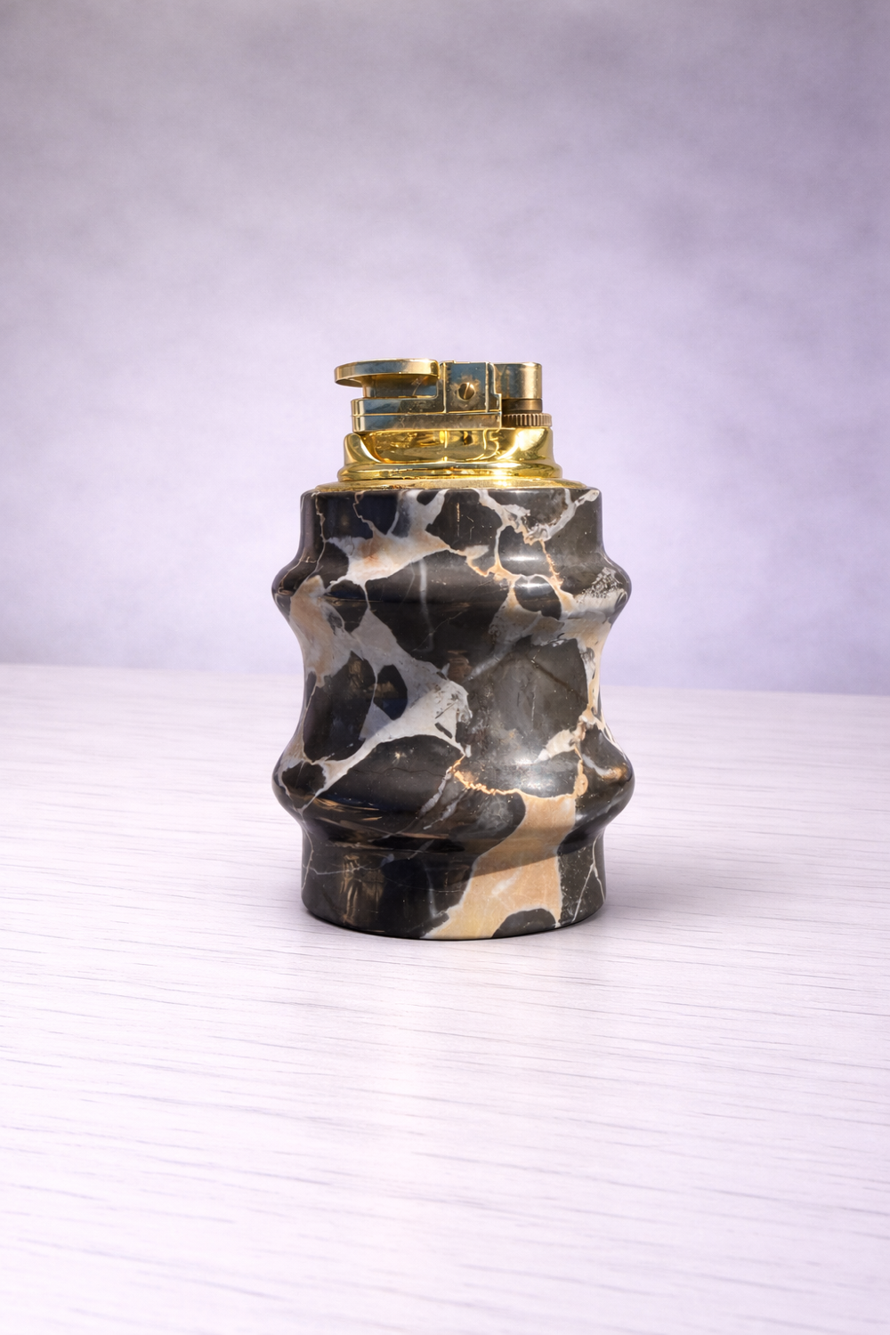 Vintage table lighter in black marble and brass