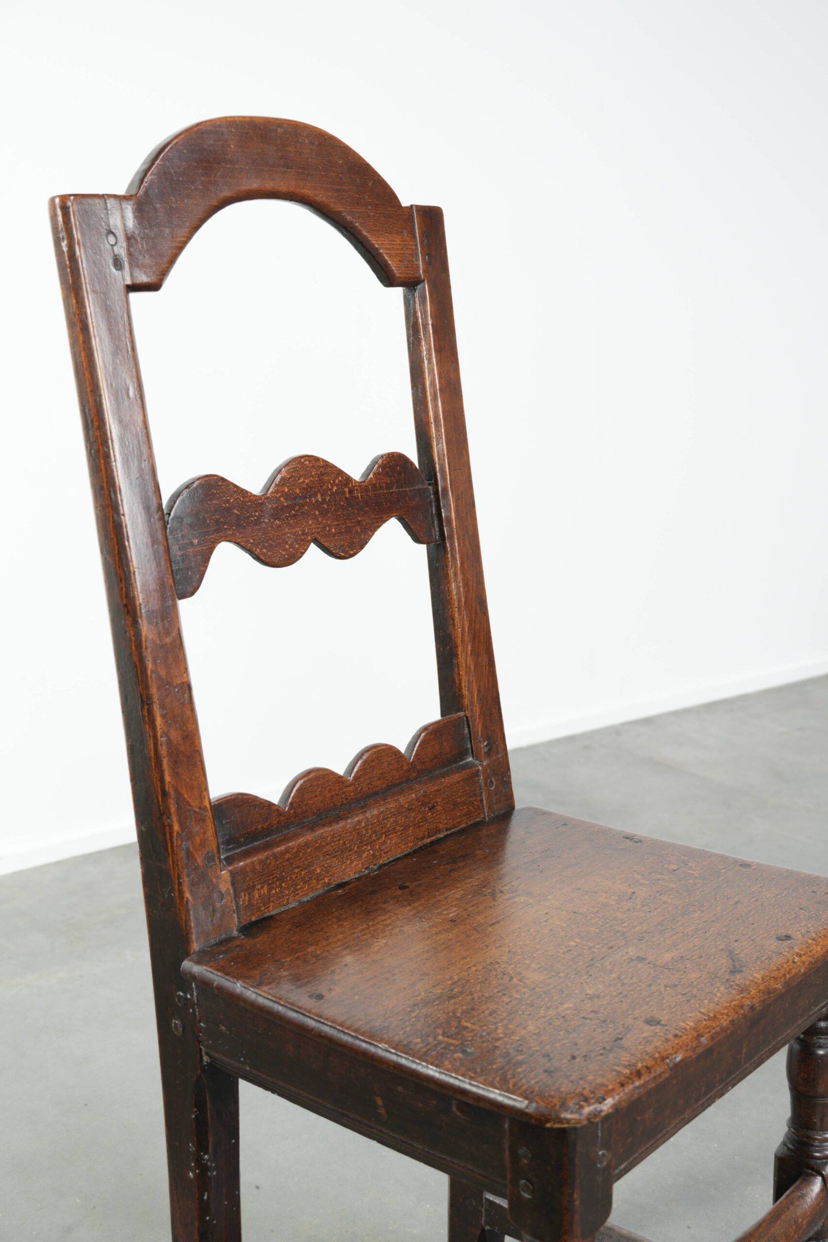 French antique Lorraine chair made of oak from the 18th century