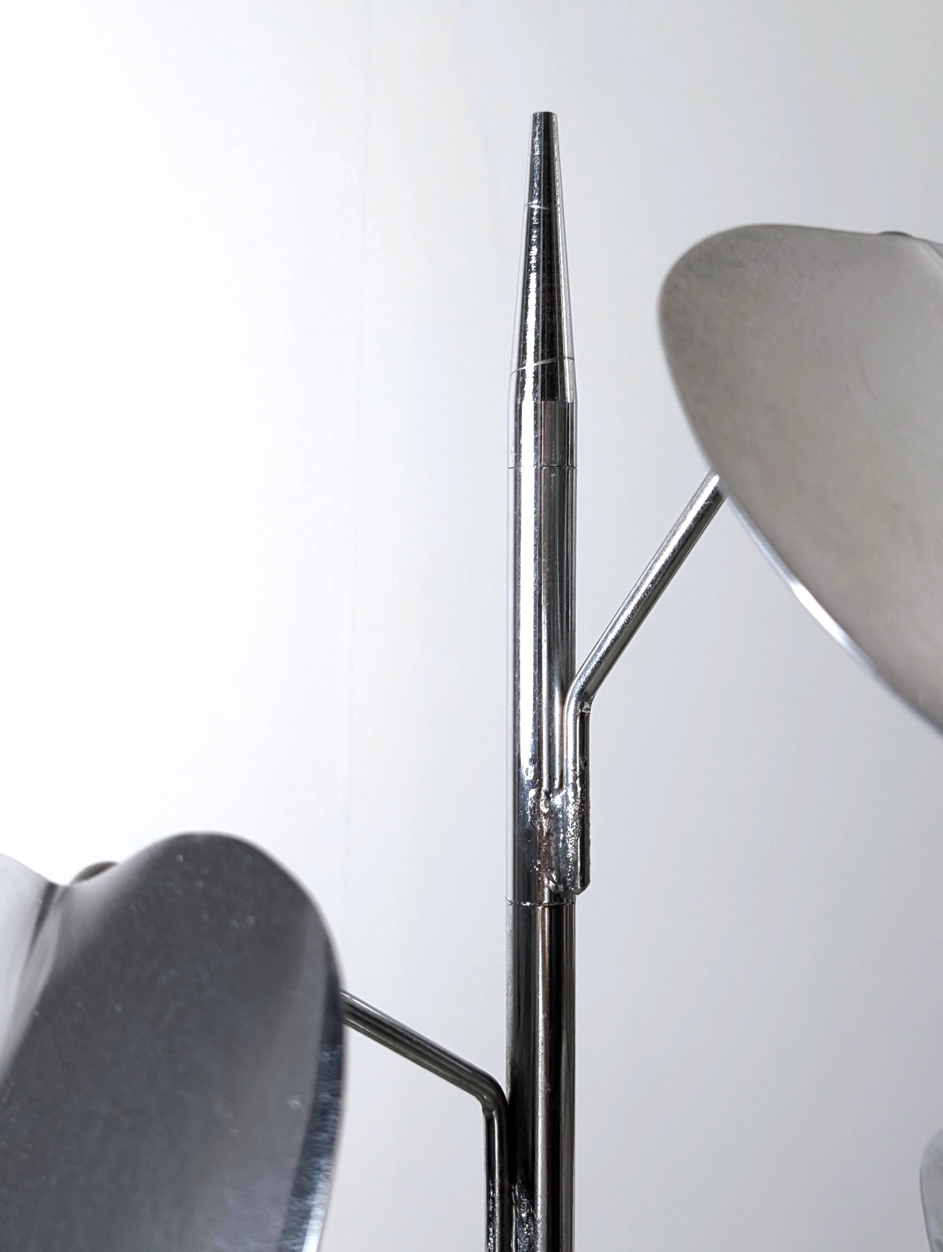 Standing sculpture with chrome leaves and circular base, 1970s