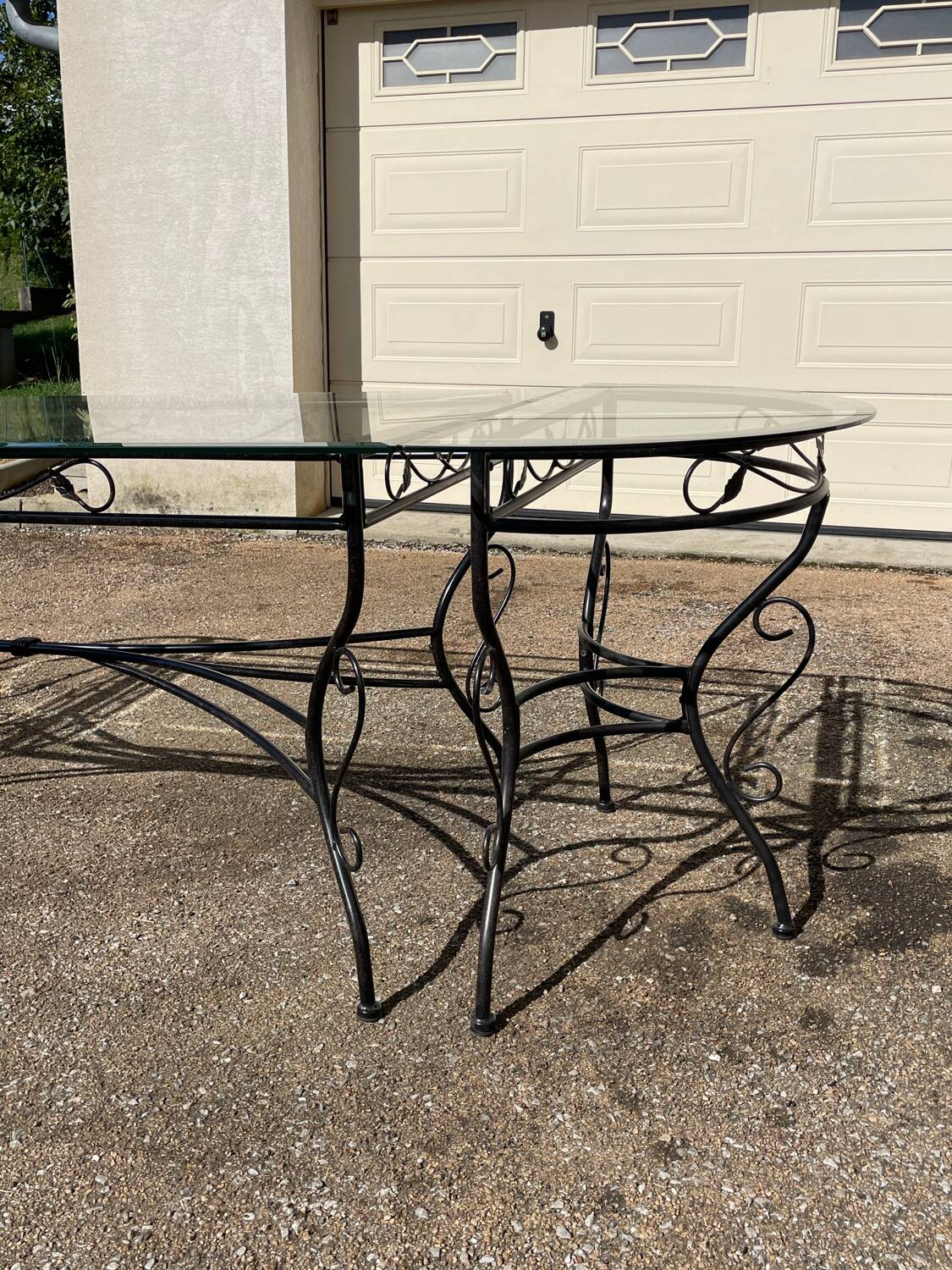 Glass and iron table with two side tables and 8 chairs