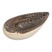 Vintage ceramic ashtray in the shape of a shell.