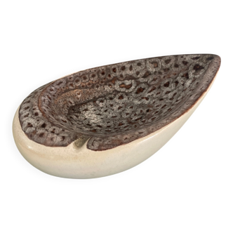 Vintage ceramic ashtray in the shape of a shell.