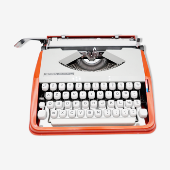 Machine à écrire hermes baby orange corail et bleue cursive révisée ruban neuf