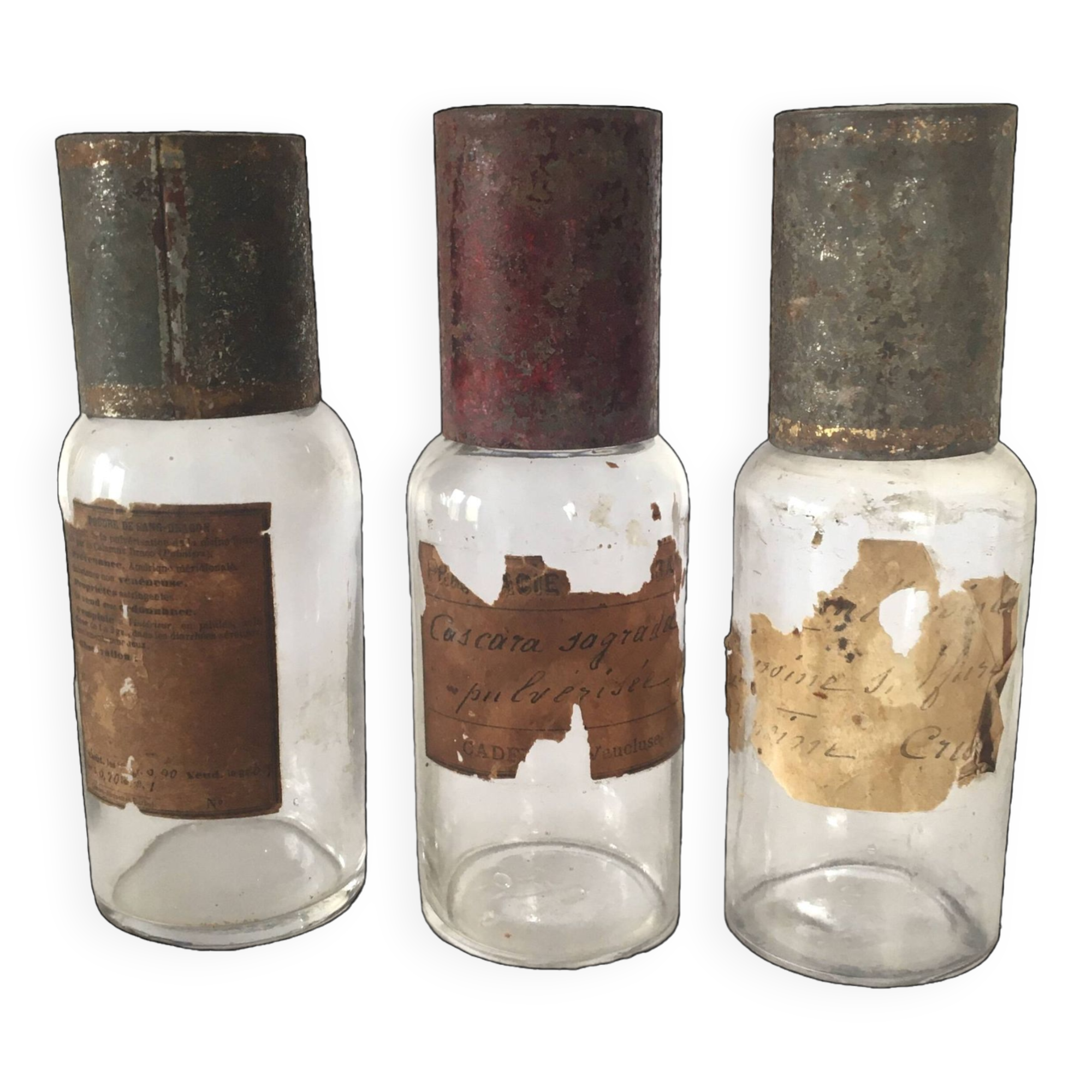 Trio apothecary bottles, painted metal caps