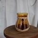 Amber glass and wicker carafe