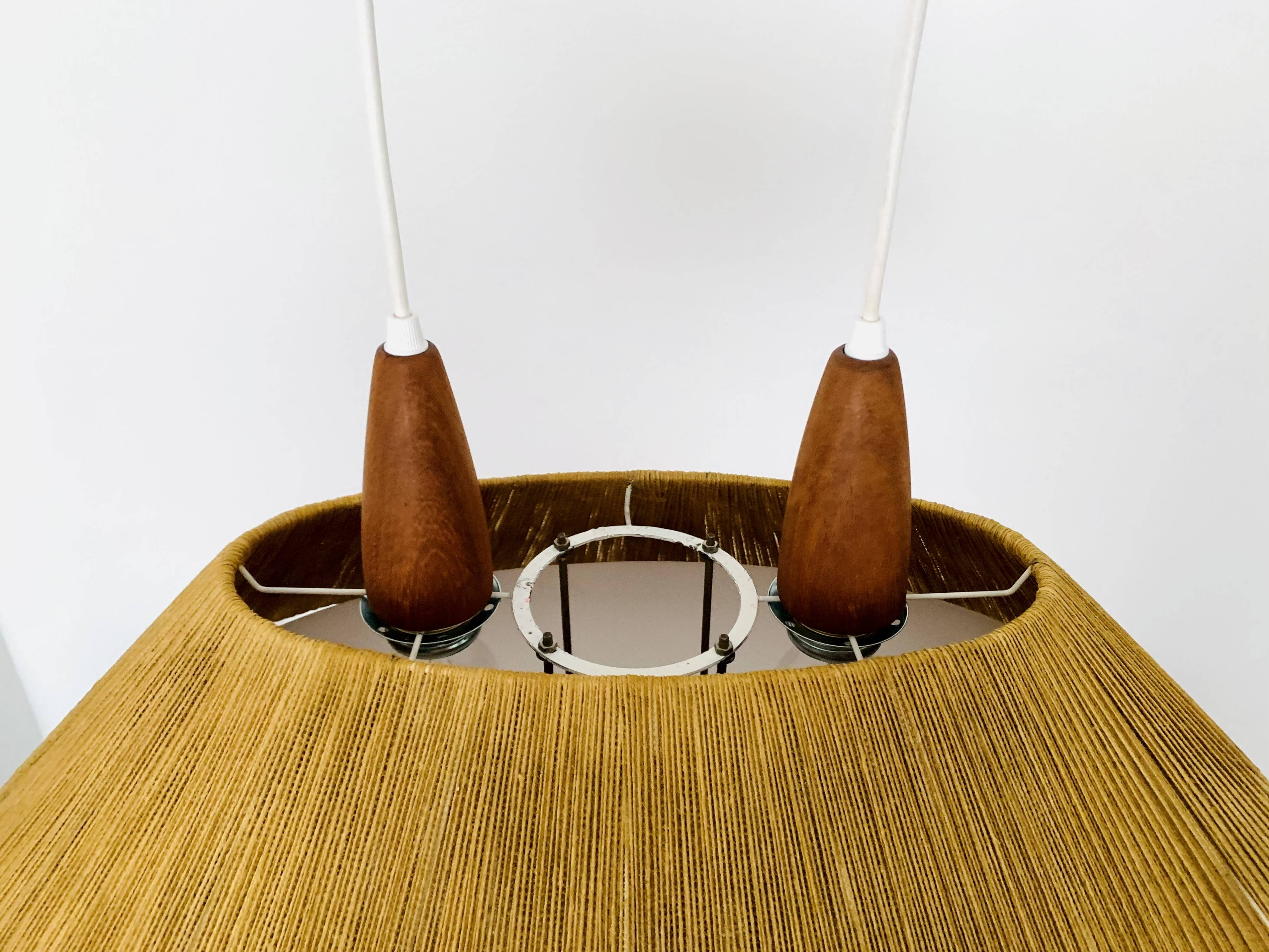 Raffia Bast and Teak Pendant Lamp from Temde