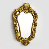 Old wall mirror in wood and gilded stucco with shell decoration, Louis XV style pediment mirror