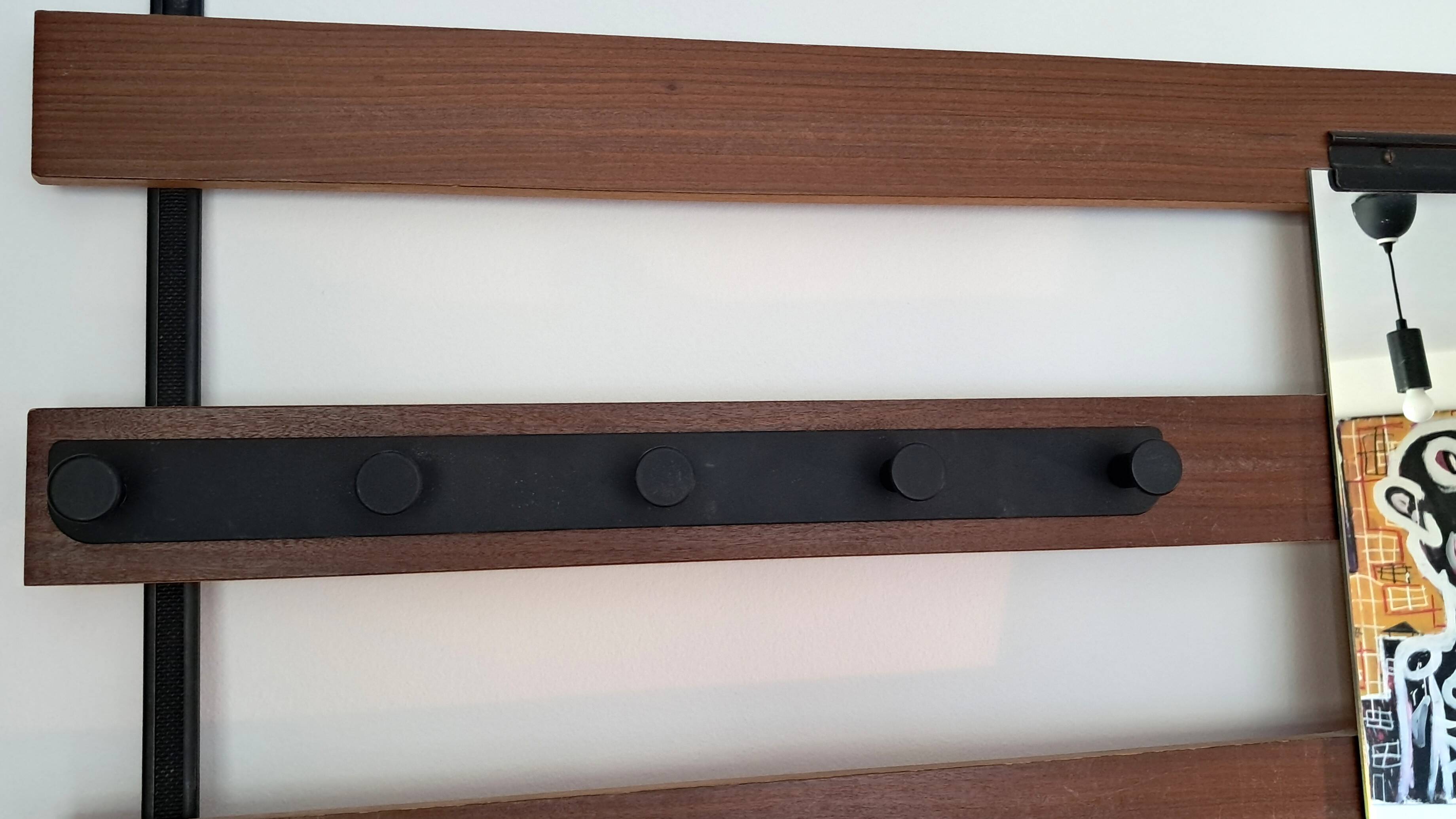 Vintage teak wall coat rack with 5 hooks and mirror.