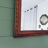 Ancient mirror in carved wood and mercury  48x63cm