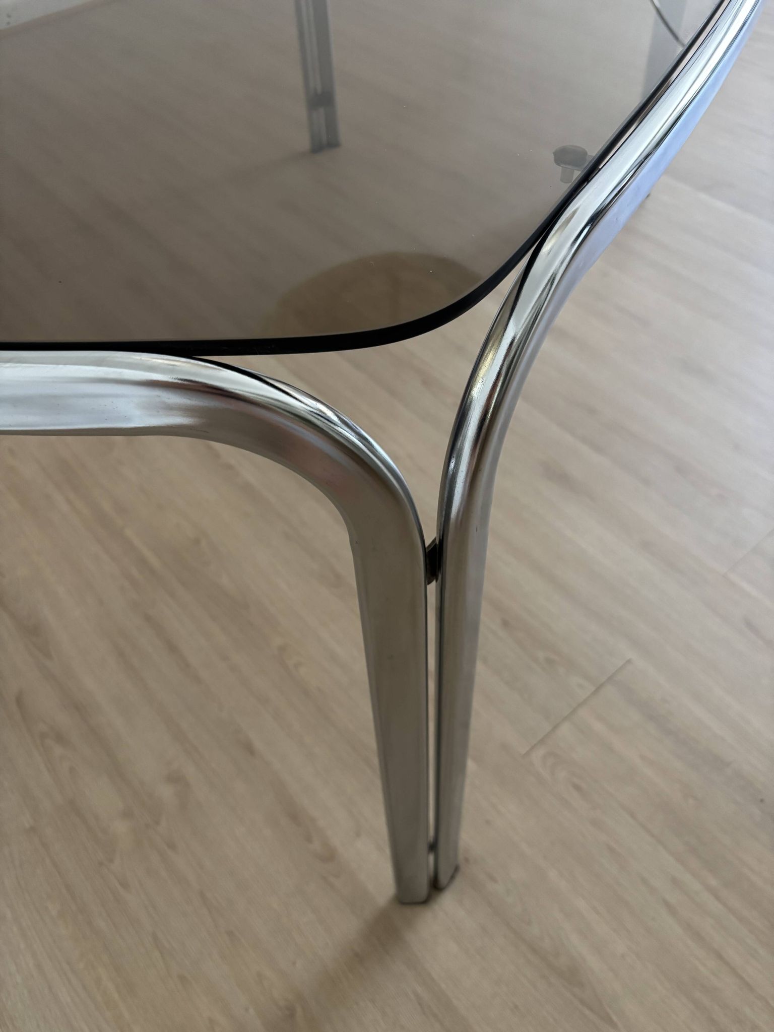 Smoked glass dining table from the 70s.