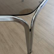 Smoked glass dining table from the 70s.