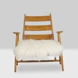 Pair of “lounge” armchairs in blond beech. 1950s