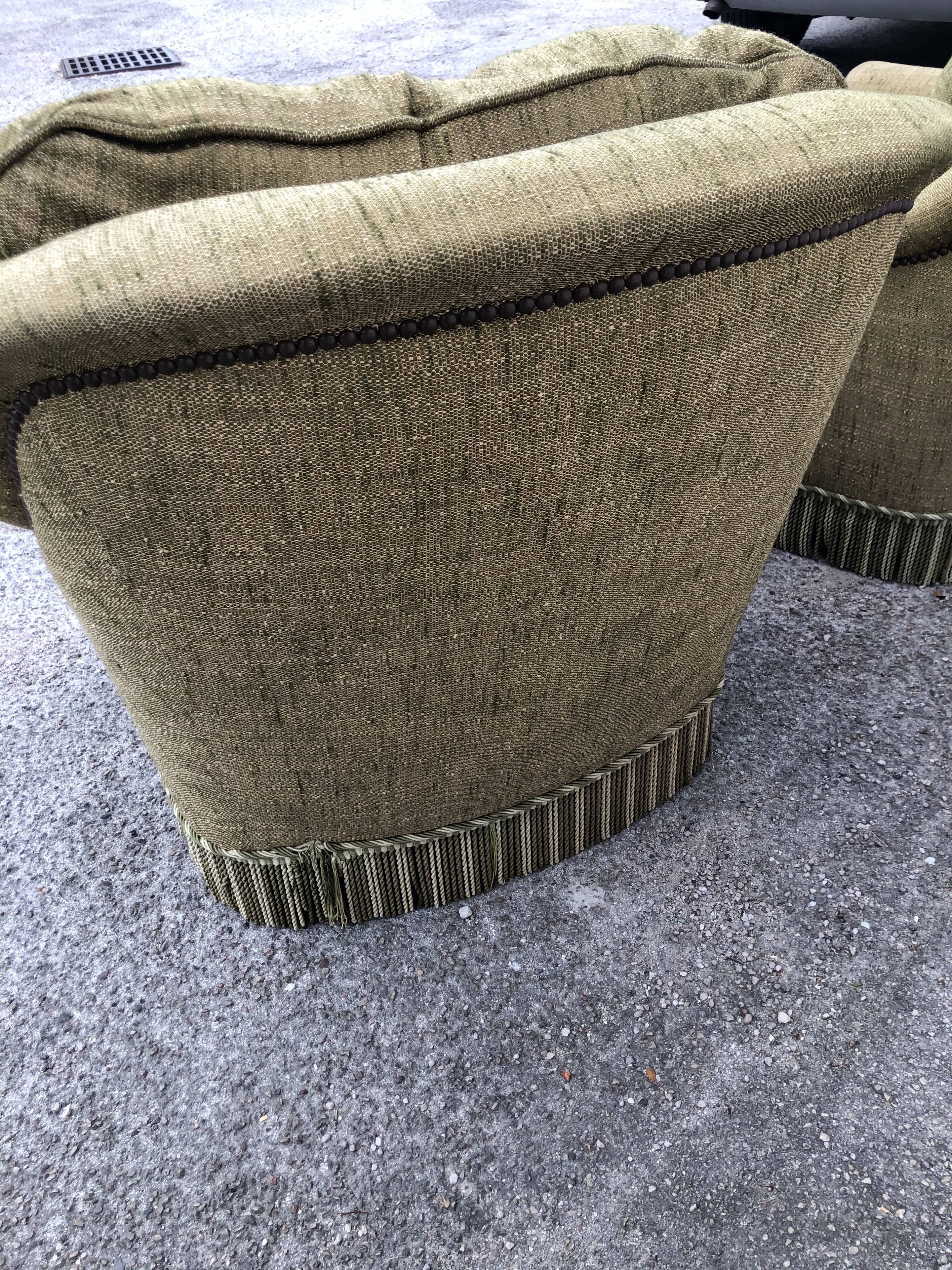 Paire de fauteuils seventies en tweed vert