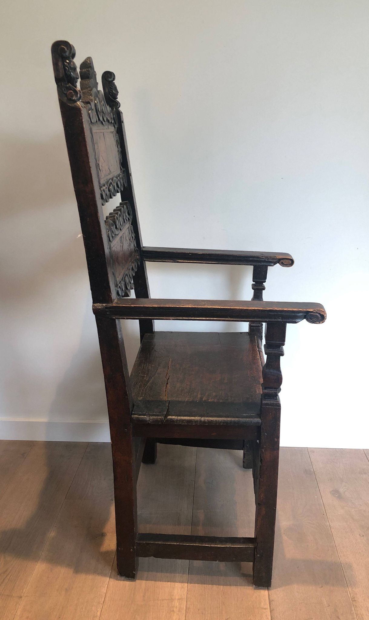 Set of an armchair and a pair of chairs in Italian Renaissance walnut