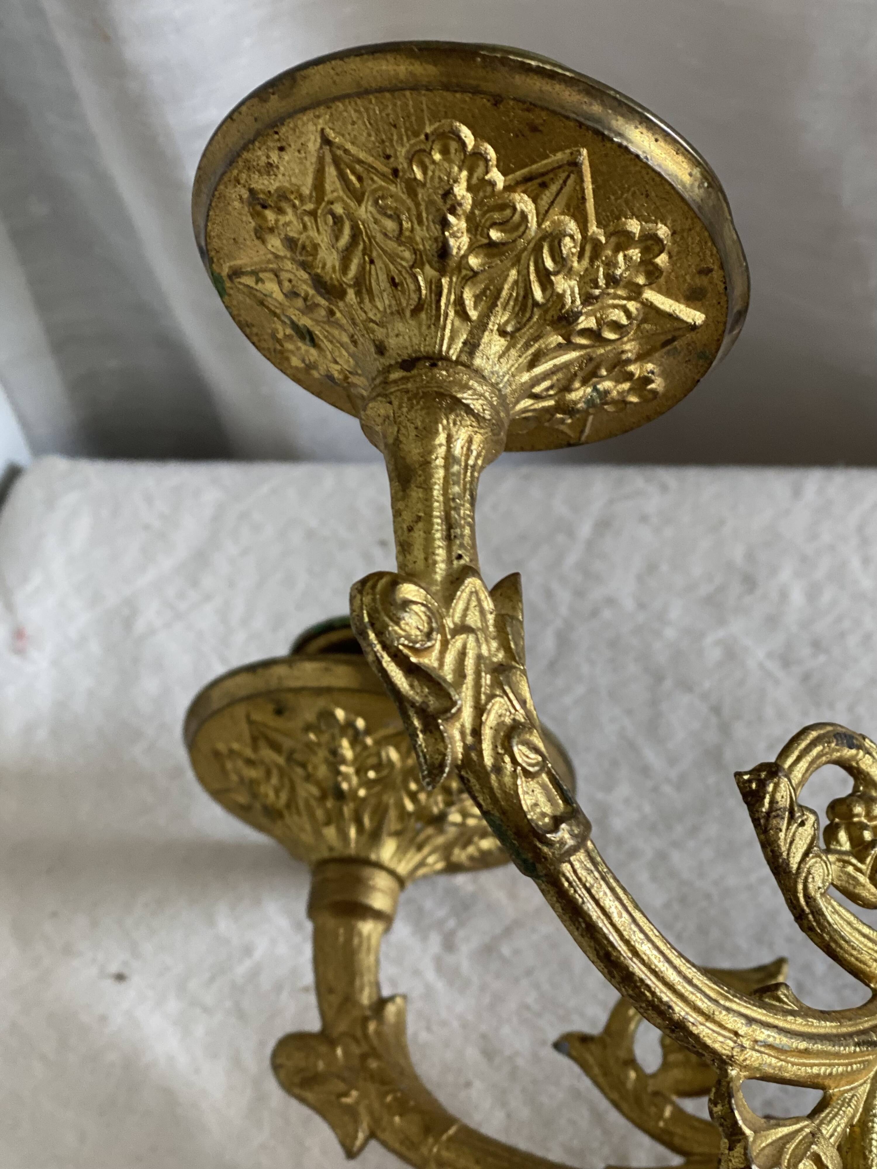 Pair of gilt bronze wall candlesticks