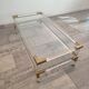 Acrylic glass and brass coffee table, 1985