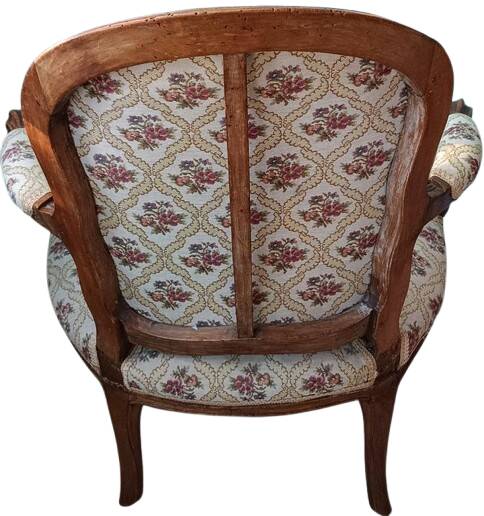 Louis XV cabriolet armchair upholstered in floral fabric