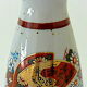 Far Eastern porcelain sake service consisting of a carafon and six cups