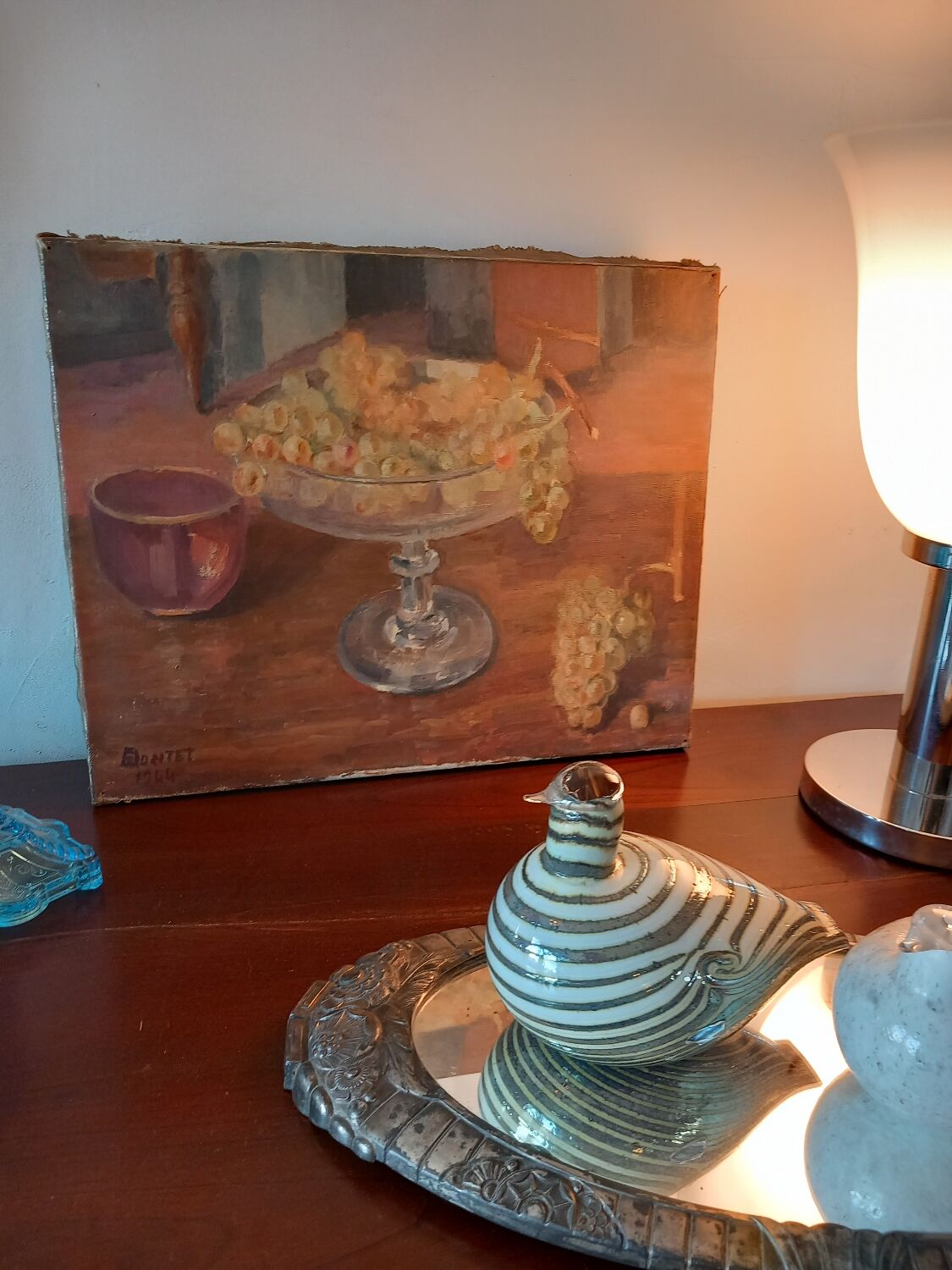 Still life painting with bunches of grapes