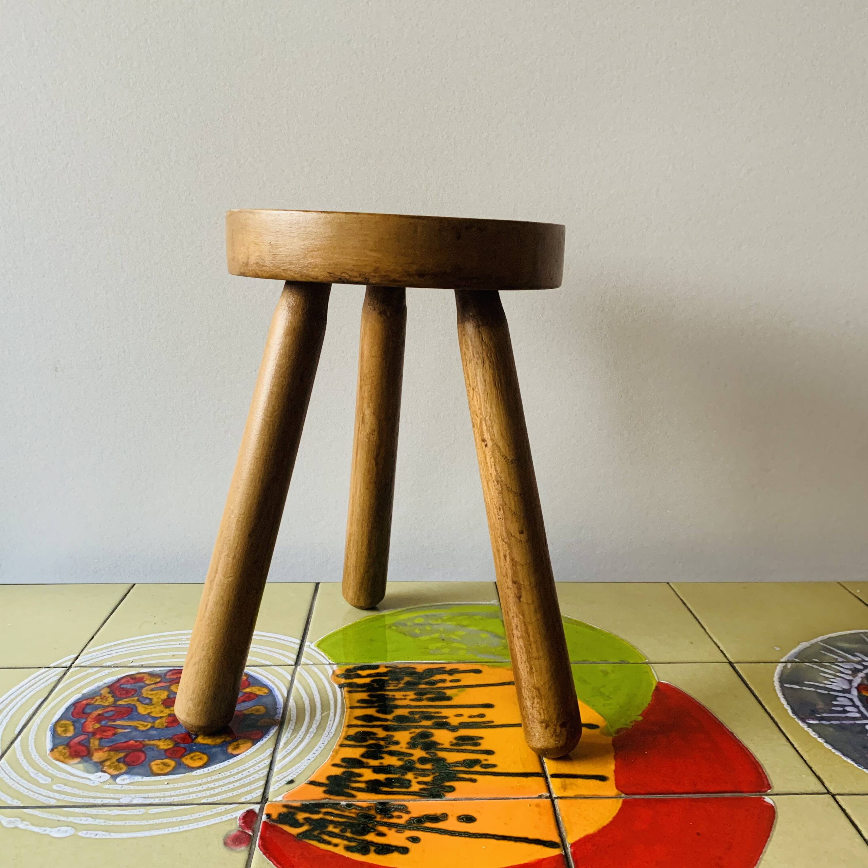 Small tripod stool in solid wood