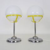 Pair of Space Age table lamps in chromed metal with opaline globe. 1970s