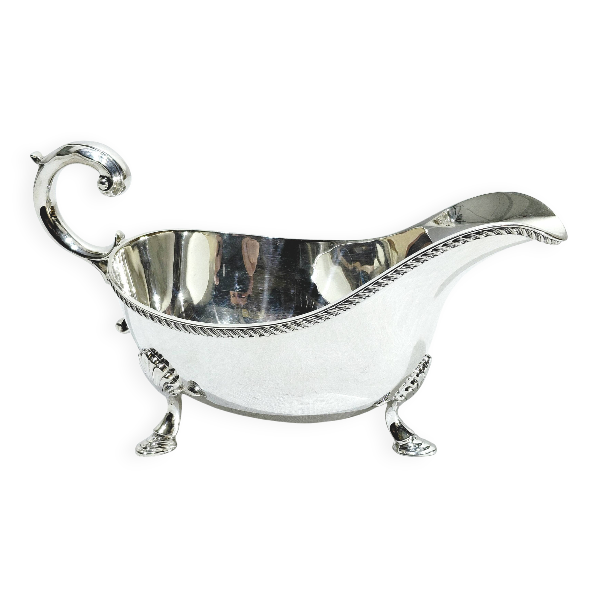 Silver sauceboat, England