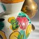Vintage handcrafted ceramic and brass vases