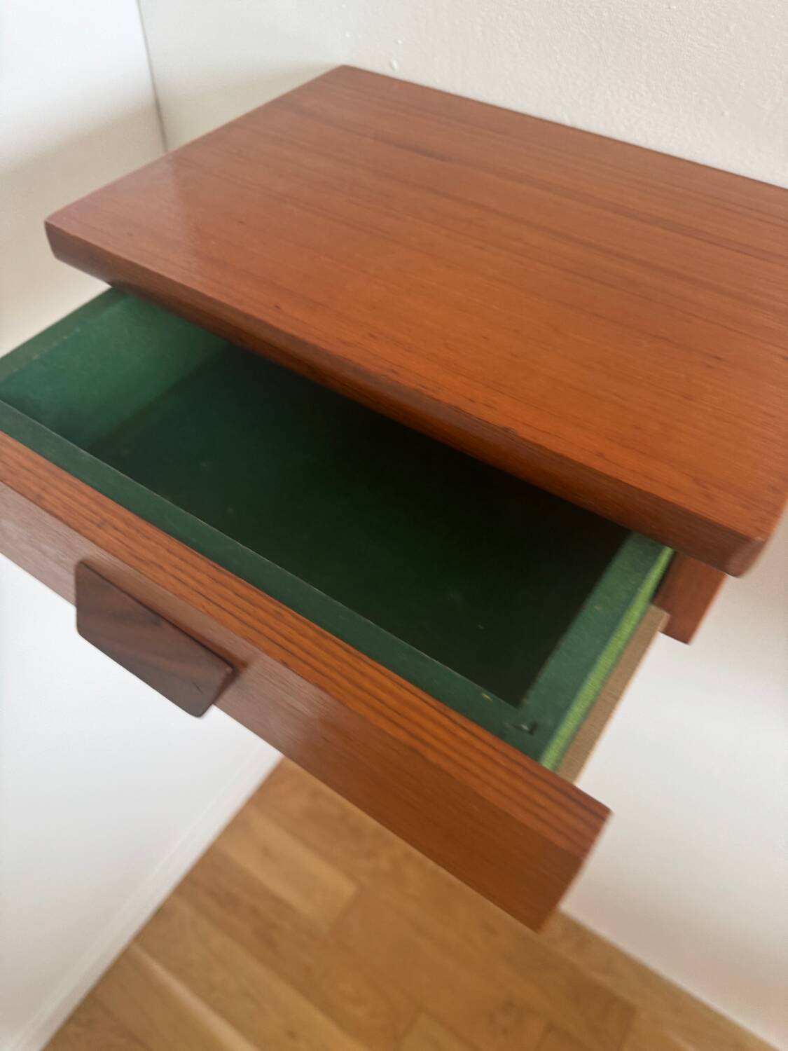 Vintage Scandinavian teak wall-mounted bedside tables.
