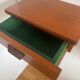 Vintage Scandinavian teak wall-mounted bedside tables.