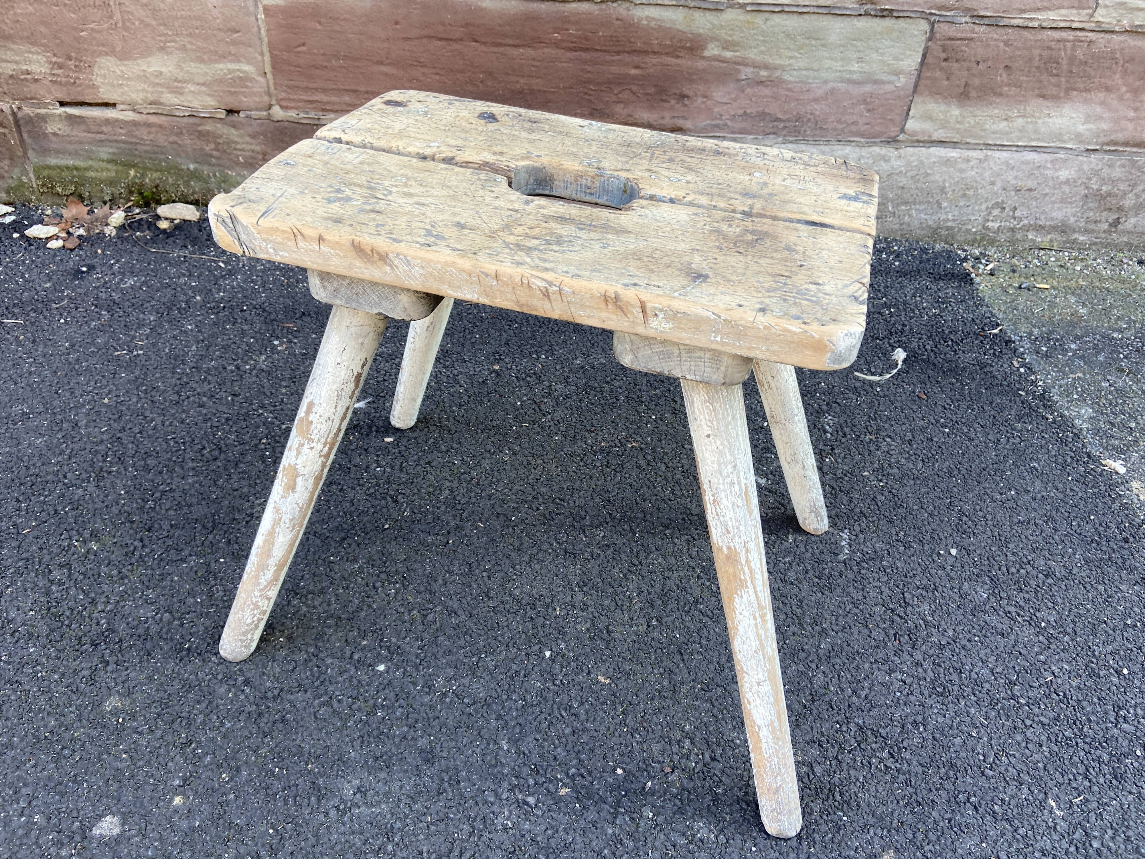 Very old rustic farmhouse stool