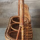 Vintage wicker bottle rack