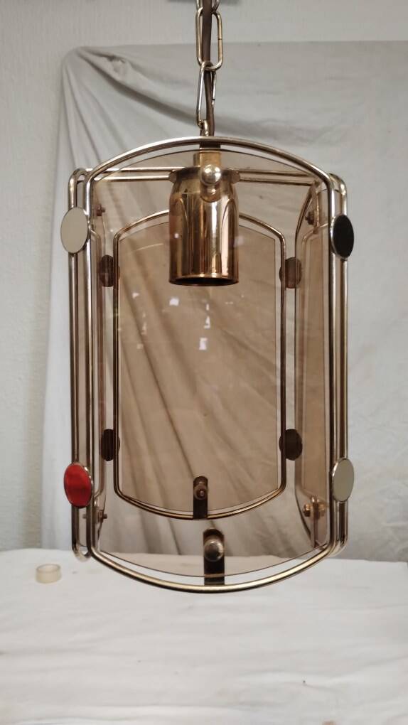 Suspension in gold metal and smoked glass