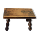 Footstool in varnished wood turns old