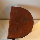 Old wooden tripod stool