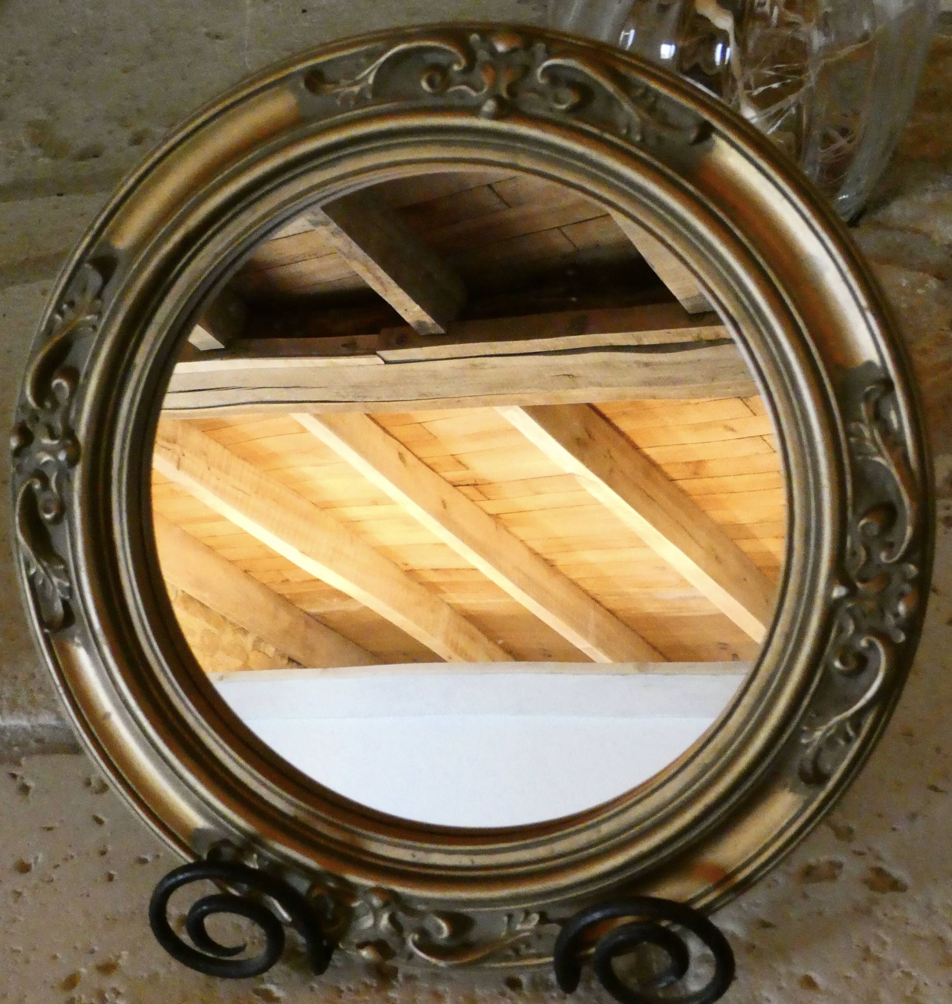 Round golden mirror