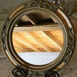 Round golden mirror