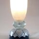 Glass lamp with floral relief in blue lotus design.