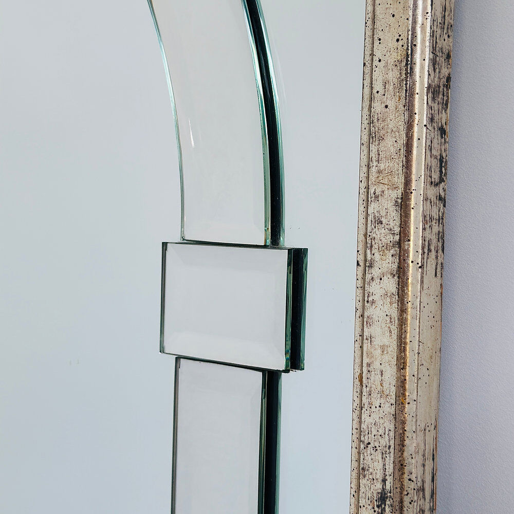Large Art Deco style beveled wall mirror with architectural arch design