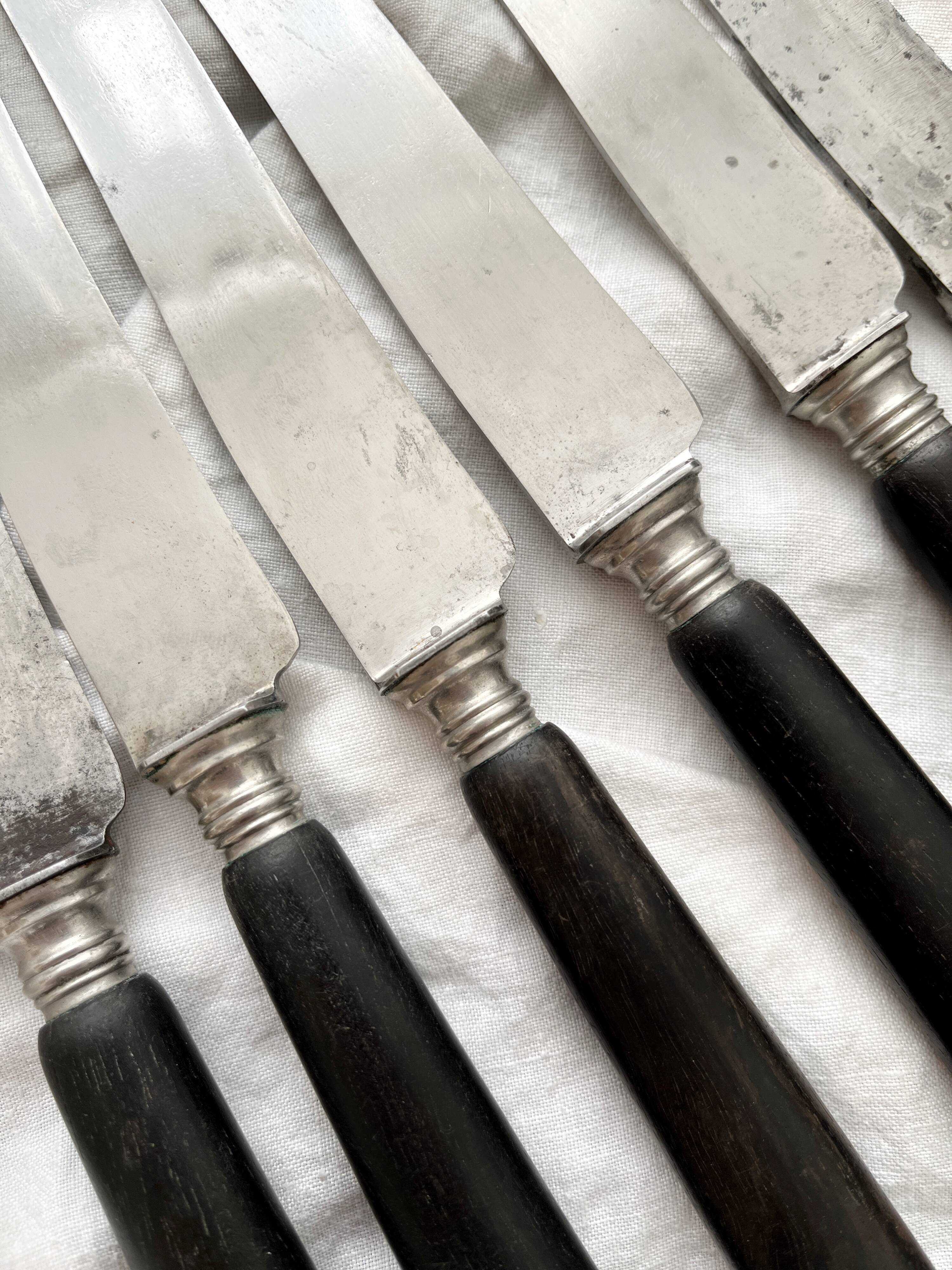6 antique black wooden table knives La Trompette, late 19th century